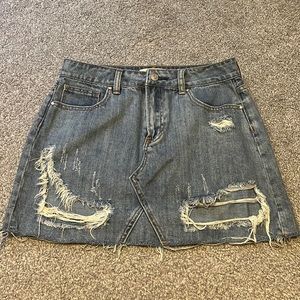 Ripped mini denim skirt